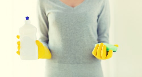 Steam carpet cleaning equipment in use on a floor