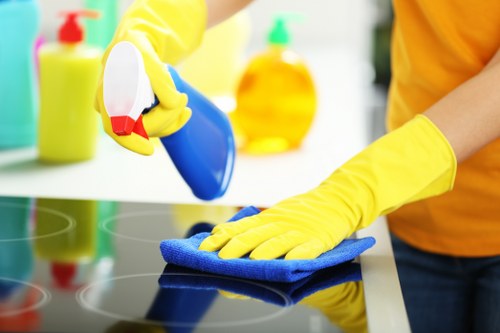 Detailed office cleaning of shared workspace surfaces