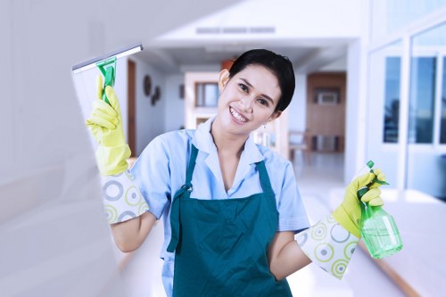 Janitorial staff performing commercial cleaning in a workplace